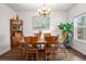 Dining room featuring wooden table and chairs, and a large window at 104 Belgian Ct, Summerville, SC 29486