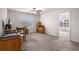 Versatile home office with built-in desk and adjacent sunroom at 104 Belgian Ct, Summerville, SC 29486