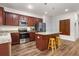 Kitchen with island, granite countertops, and stainless steel appliances at 104 Belgian Ct, Summerville, SC 29486
