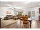 Spacious living room featuring hardwood floors and a cozy seating area at 104 Belgian Ct, Summerville, SC 29486