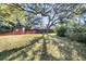 Large backyard with mature trees and shed at 1055+1057 Glenshaw St, North Charleston, SC 29405