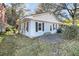 Small light blue house with a charming front entrance at 1055+1057 Glenshaw St, North Charleston, SC 29405