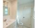 Clean bathroom with white vanity, toilet and marble-look flooring at 106 Reardon Ave, Walterboro, SC 29488