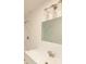 Bright bathroom with updated vanity and large mirror at 106 Reardon Ave, Walterboro, SC 29488