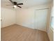 Well-lit bedroom with hardwood floors and a double door closet at 106 Reardon Ave, Walterboro, SC 29488