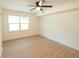Well-lit bedroom with wood floors and a window at 106 Reardon Ave, Walterboro, SC 29488