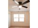 Bright bedroom with ceiling fan, large window, and light wood flooring at 106 Reardon Ave, Walterboro, SC 29488