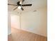 Spacious bedroom with ceiling fan and access to another room at 106 Reardon Ave, Walterboro, SC 29488