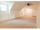 Spacious bonus room with high ceilings, wood flooring, and ample natural light at 106 Reardon Ave, Walterboro, SC 29488