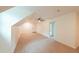 Bright bonus room with wood floors, ceiling fan, and multiple windows at 106 Reardon Ave, Walterboro, SC 29488