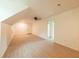 Spacious bonus room with light flooring and ceiling fan at 106 Reardon Ave, Walterboro, SC 29488