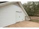 Deck with white siding and door leading to attic at 106 Reardon Ave, Walterboro, SC 29488