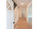 Light and airy entryway with hardwood floors and view of staircase at 106 Reardon Ave, Walterboro, SC 29488