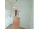 Bright entryway with white doors and view of living room with fireplace at 106 Reardon Ave, Walterboro, SC 29488
