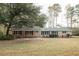 Brick ranch home with large yard and mature trees at 106 Reardon Ave, Walterboro, SC 29488