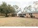 Ranch home with a large yard and mature trees at 106 Reardon Ave, Walterboro, SC 29488