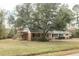 Ranch home with deck and large oak tree at 106 Reardon Ave, Walterboro, SC 29488