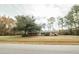 Brick ranch home with large yard and mature trees at 106 Reardon Ave, Walterboro, SC 29488