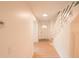 Bright hallway with white walls and wood-look flooring at 106 Reardon Ave, Walterboro, SC 29488