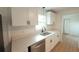 Modern kitchen with white shaker cabinets and quartz counters at 106 Reardon Ave, Walterboro, SC 29488