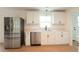 Modern kitchen with white shaker cabinets and stainless steel appliances at 106 Reardon Ave, Walterboro, SC 29488