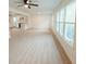 Bright living room with large windows and hardwood floors at 106 Reardon Ave, Walterboro, SC 29488