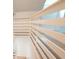 Modern white staircase with sleek railing leading to the upper level at 106 Reardon Ave, Walterboro, SC 29488