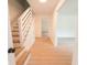 Modern staircase with a sleek railing leading to the upper level at 106 Reardon Ave, Walterboro, SC 29488