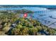 Aerial view of waterfront property with expansive lot and private pier at 122 Cainhoy Landing Rd, Charleston, SC 29492