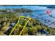 Aerial view showing home and waterfront lot at 122 Cainhoy Landing Rd, Charleston, SC 29492