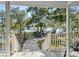 View from deck shows backyard, dock, and water access at 122 Cainhoy Landing Rd, Charleston, SC 29492