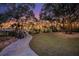Firepit and seating area in landscaped backyard at 122 Cainhoy Landing Rd, Charleston, SC 29492