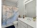 Bathroom with nautical shower curtain and updated vanity at 122 Cainhoy Landing Rd, Charleston, SC 29492