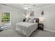 Serene bedroom with wood accents and window seat at 122 Cainhoy Landing Rd, Charleston, SC 29492