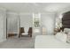 Bright bedroom with sitting area and access to bathroom at 122 Cainhoy Landing Rd, Charleston, SC 29492