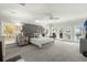 Main bedroom with a plush bed and access to a deck at 122 Cainhoy Landing Rd, Charleston, SC 29492