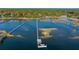 Private boat dock with covered seating area at 122 Cainhoy Landing Rd, Charleston, SC 29492