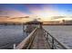 Wooden dock with gazebo leading to tranquil water at 122 Cainhoy Landing Rd, Charleston, SC 29492