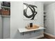 Convenient drop zone with shelving and a floating desk at 122 Cainhoy Landing Rd, Charleston, SC 29492
