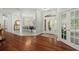 Spacious entryway with hardwood floors, columns and formal dining area at 122 Cainhoy Landing Rd, Charleston, SC 29492