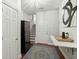 Bright entryway with staircase, wine cooler, and built-in work station at 122 Cainhoy Landing Rd, Charleston, SC 29492