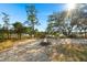 Scenic fire pit area overlooking serene waterfront landscape at 122 Cainhoy Landing Rd, Charleston, SC 29492