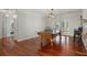 Game room features ping pong table, hardwood floors, and access to other rooms at 122 Cainhoy Landing Rd, Charleston, SC 29492