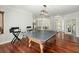 Game room with ping pong table, hardwood floors, and views into other rooms at 122 Cainhoy Landing Rd, Charleston, SC 29492
