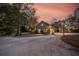 Brick garage with driveway and surrounding trees at 122 Cainhoy Landing Rd, Charleston, SC 29492