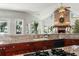Gourmet kitchen features granite counters and breakfast bar at 122 Cainhoy Landing Rd, Charleston, SC 29492