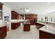 Large kitchen with island, granite counters, and ample cabinetry at 122 Cainhoy Landing Rd, Charleston, SC 29492