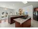 Open concept kitchen with large island and granite countertops at 122 Cainhoy Landing Rd, Charleston, SC 29492