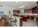 Spacious kitchen with granite countertops and cherry cabinets at 122 Cainhoy Landing Rd, Charleston, SC 29492