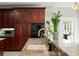 Kitchen boasts granite counters, cherry cabinets, and a large sink at 122 Cainhoy Landing Rd, Charleston, SC 29492